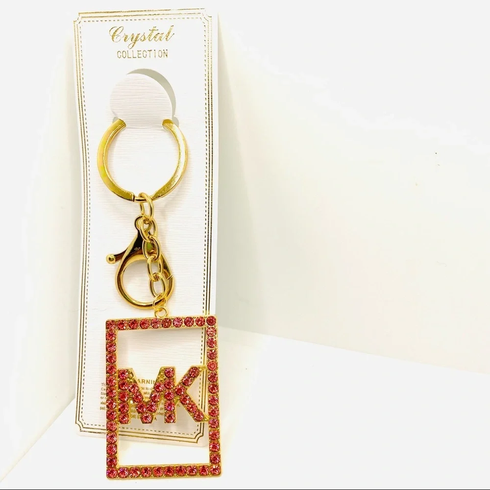 Purse Charm Key Chain MK Pink Crystals set in golden tone. BRAND NEW